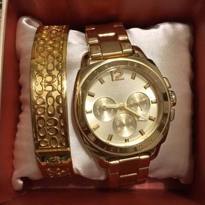 GOLD: Coach watch and bangle